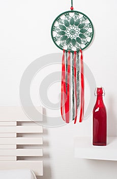 Dream catcher with green red laces