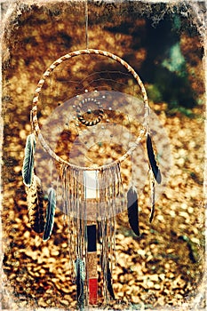Dream Catcher on natural background, ethnic amulet.