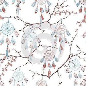 Dream catchers on the bare branches seamless vector pattern