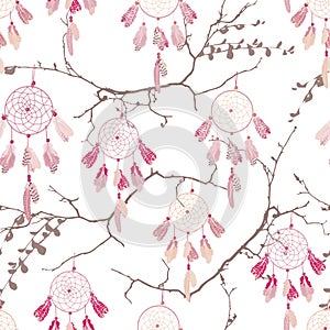 Dream catchers on the bare branches seamless vector pattern