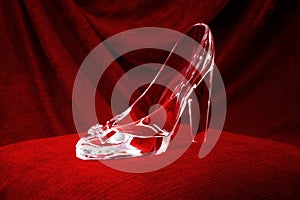 Dream and fantasy, classic literature and magical fairy tale story conceptual idea with clear crystal glass slipper or shoe that photo