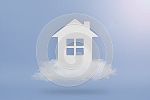Dream House. The concept of buying a dream home. White house in the clouds on a blue sky background. Purchase of real