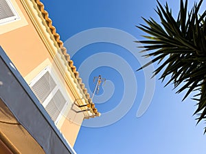 Dream house: Tropical cityscape, blue sky