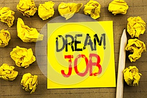 Dream Job. Business concept for Dreaming About Career written on sticky note paper on the vintage background. Folded yellow papers