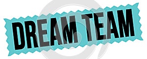 DREAM TEAM text written on blue-black zig-zag stamp