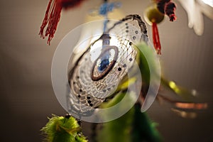 Dreamcatcher in the light of the lamp.