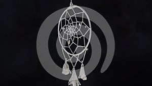 Dreamcatcher with smoke concept of calm, pacification, care and protection