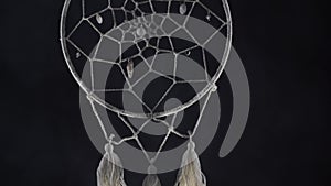 Dreamcatcher with smoke concept of calm, pacification, care and protection