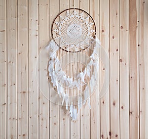 Dreamcather, american native decoration on wooden background, Indoor