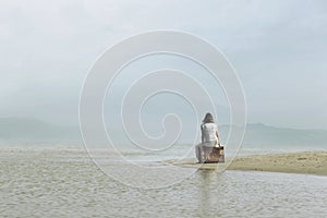 Dreamer woman relaxing in a surreal place photo