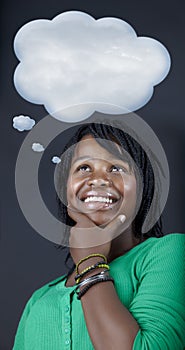 Dreaming African student with a though bubble