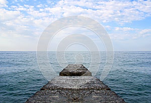 Dreaming on a empty concrete pier