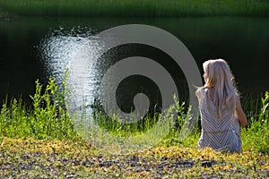 Dreaming girl on shore