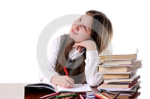 Dreaming schoolgirl. Isolated on white