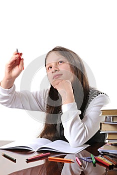 Dreaming schoolgirl. Isolated on white