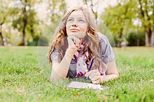 Dreaming teenager in park