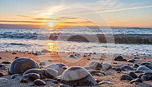 dreamlike, sunset between rocks in the sea of the Baltic Sea on the island of Rügen