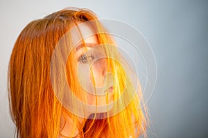 Dreammy portrait of redhead girl in soft focus