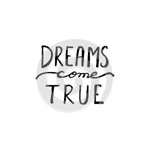 Dreams Come True. Calligraphic quote. Typographic Design. Black Hand Lettering Text Isolated on White Background.