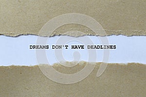 dreams don\'t have deadlines on white paper