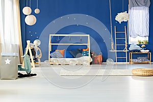 Dreamy bedroom with blue wall