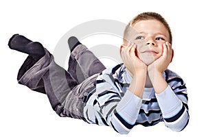 Dreamy boy on the floor