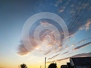 Dreamy colorful evening sky with fluffy clouds