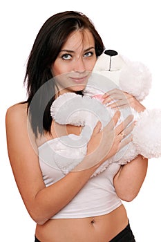 Dreamy cute girl with a teddybear