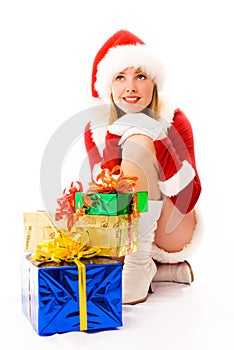 Dreamy girl with Christmas presents