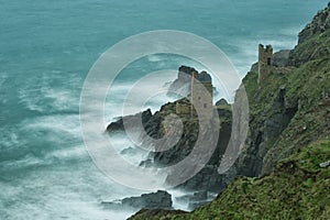 Dreamy long exposure. Mine engine houses at the foot of cliffs, Botallack, Cornwall.