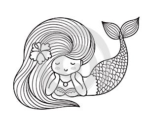 Dreamy lying mermaid with long curly hair.