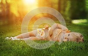 Dreamy photo of a little girl in the grass