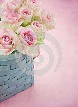 Dreamy romantic pink roses in a basket