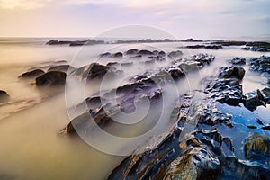 Dreamy Seascape In Portugal With Sea And Waves At Sunset