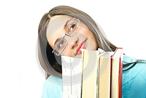 Dreamy student with books