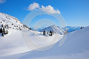 Dreamy winter landscape with snow covered slope, ski resort Rofan alps photo
