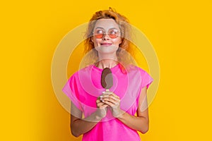 dreamy woman with icelolly ice cream in studio. woman with icelolly ice cream