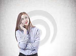 Dreamy young woman in a blue shirt, mock up