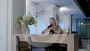 Dreamy young woman enjoying her coffee in a cafe