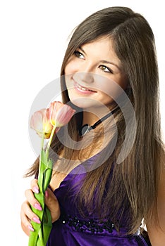 Dreamy young woman with tulips