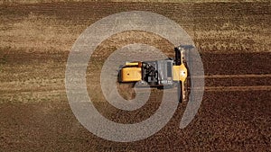 Drectly above view of combine harvesters Agricultural machinery. The machine for harvesting grain crops.