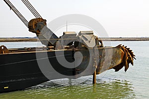 Dredge front parts in the sea