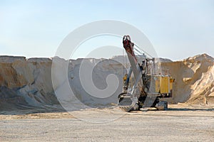 Dredge in sandy open-cast mine