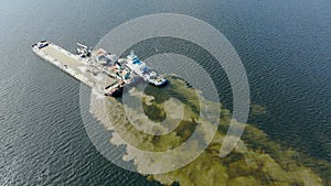 Dredge vessels are excavating sand in the open water