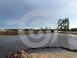 Dredger at river bank