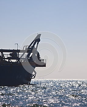 Dredger at sea photo