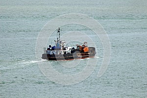 Dredger at sea
