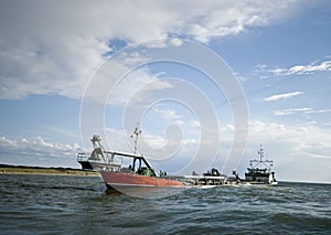 Dredger ship on ocean