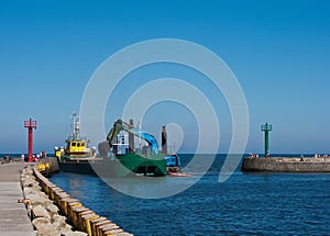 Dredger ship in port photo