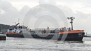 Dredging Vessel Entering the Harbor